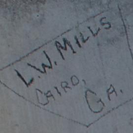 L.W. MILLS